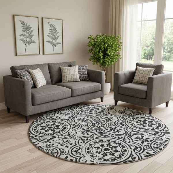 HomeRoots 8' Black And Ivory Medallion Round Rug - Washable, UV Protected, Stylish for High-Traffic Homes 663662