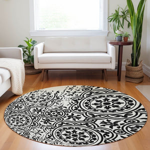 HomeRoots 8' Black And Ivory Medallion Round Rug - Washable, UV Protected, Stylish for High-Traffic Homes 663662