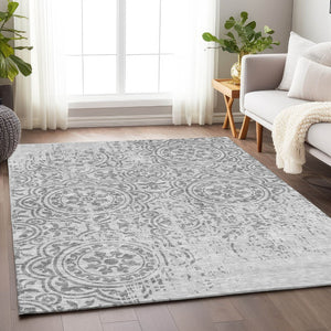 HomeRoots 5' X 8' Silver and Gray Medallion Area Rug - Washable, UV Protected, Durable for High-Traffic Spaces 663709