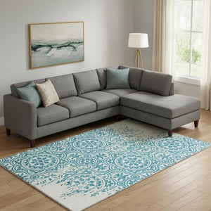 HomeRoots 8' X 10' Teal and Ivory Medallion Washable Area Rug - Durable, Stylish, UV Protected for High Traffic Spaces 663723