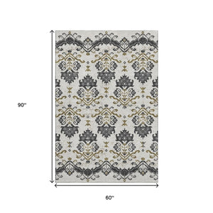 HomeRoots 5' X 8' Medallion Area Rug in Black, Beige & Gold - Washable, UV Protected, & Pet-Friendly Design! 663734
