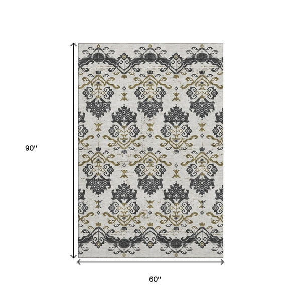 HomeRoots 5' X 8' Medallion Area Rug in Black, Beige & Gold - Washable, UV Protected, & Pet-Friendly Design! 663734