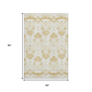 HomeRoots 5' X 8' Gold And Beige Medallion Area Rug - Washable, UV Protected, Stain Resistant for Stylish Homes 663752