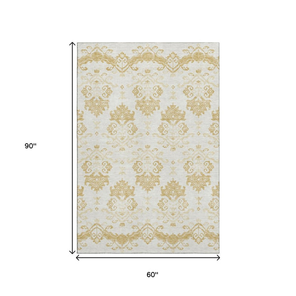 HomeRoots 5' X 8' Gold And Beige Medallion Area Rug - Washable, UV Protected, Stain Resistant for Stylish Homes 663752
