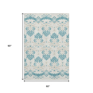 HomeRoots 5' X 8' Medallion Washable Area Rug in Teal, Ivory & Gray - Durable, UV Protected, Easy Care Design 663794