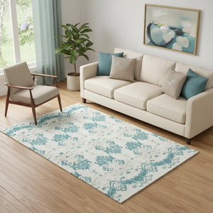 HomeRoots 5' X 8' Medallion Washable Area Rug in Teal, Ivory & Gray - Durable, UV Protected, Easy Care Design 663794
