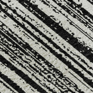 HomeRoots 5' X 8' Black And Ivory Striped Washable Area Rug - Durable, UV Protected, Perfect for High Traffic Homes 663800