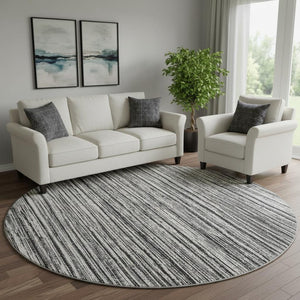 HomeRoots 8' Black And Ivory Striped Round Rug - Washable, UV-Protected, Durable for Homes with Kids & Pets 663801