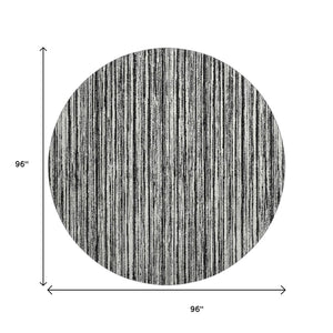 HomeRoots 8' Black And Ivory Striped Round Rug - Washable, UV-Protected, Durable for Homes with Kids & Pets 663801