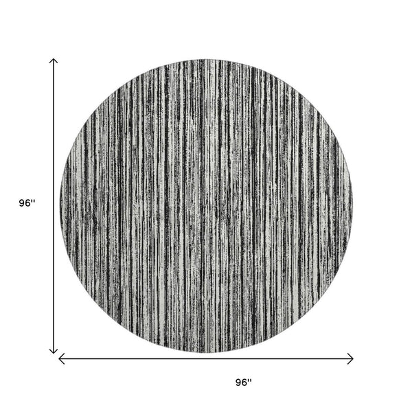 HomeRoots 8' Black And Ivory Striped Round Rug - Washable, UV-Protected, Durable for Homes with Kids & Pets 663801