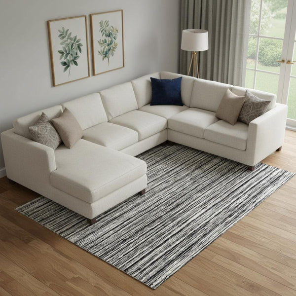 HomeRoots 8' X 10' Black and Ivory Striped Washable Area Rug with UV Protection for Stylish, Easy Living Spaces 663802