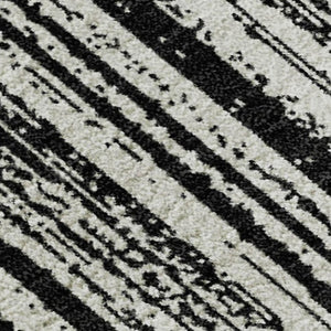HomeRoots 8' X 10' Black and Ivory Striped Washable Area Rug with UV Protection for Stylish, Easy Living Spaces 663802