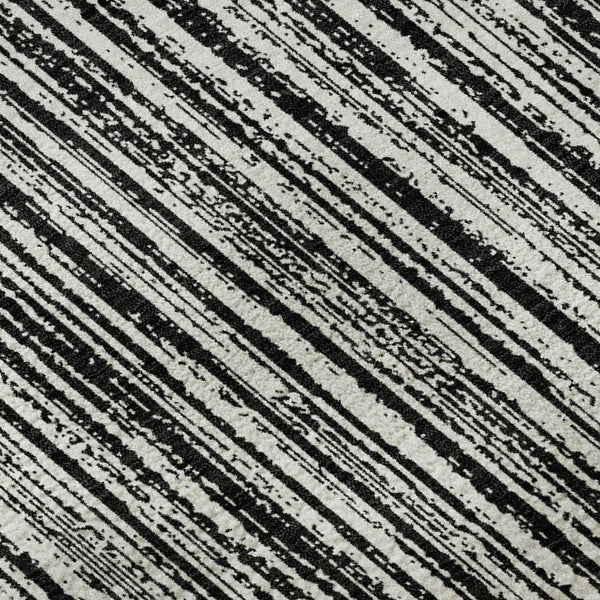 HomeRoots 9' X 12' Black and Ivory Striped Area Rug - Durable, Washable, and UV-Protected for Modern Living Spaces 663803