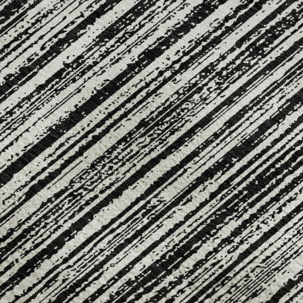 HomeRoots 9' X 12' Black and Ivory Striped Area Rug - Durable, Washable, and UV-Protected for Modern Living Spaces 663803