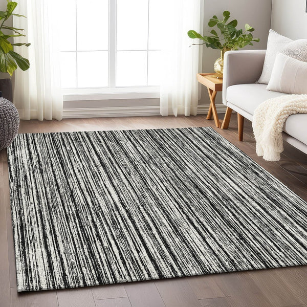 HomeRoots 10' Black and Ivory Striped Washable Area Rug - Stain Resistant, UV Protected for Busy Homes! 663804