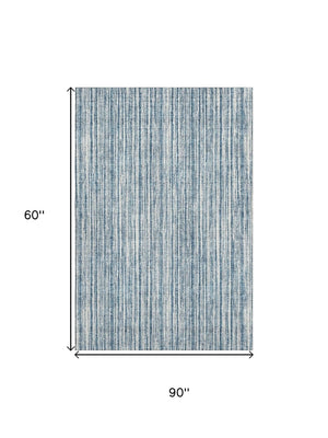 HomeRoots 5' X 8' Blue And Ivory Striped Area Rug - Washable, UV Protected, Stain-Resistant, Durable Design 663806
