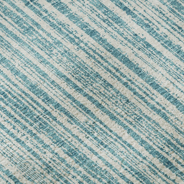 HomeRoots 8' X 10' Teal and Ivory Striped Washable Area Rug with UV Protection for Indoor/Outdoor Use 663868
