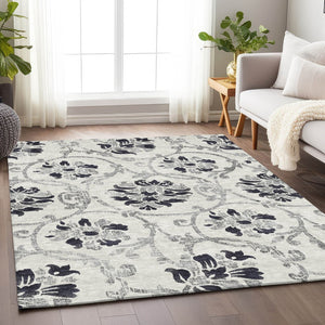 HomeRoots 5' X 8' Black And Ivory Floral Area Rug - Durable, Washable, UV-Protected for Style & Comfort 663944