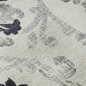 HomeRoots 5' X 8' Black And Ivory Floral Area Rug - Durable, Washable, UV-Protected for Style & Comfort 663944