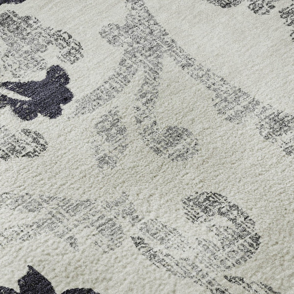 HomeRoots 5' X 8' Black And Ivory Floral Area Rug - Durable, Washable, UV-Protected for Style & Comfort 663944