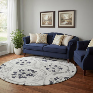 HomeRoots 8' Washable Black and Ivory Floral Round Rug with UV Protection for Elegant, Family-Friendly Living Spaces 663945