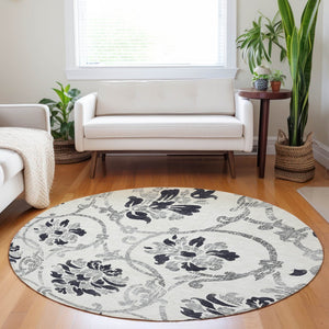 HomeRoots 8' Washable Black and Ivory Floral Round Rug with UV Protection for Elegant, Family-Friendly Living Spaces 663945