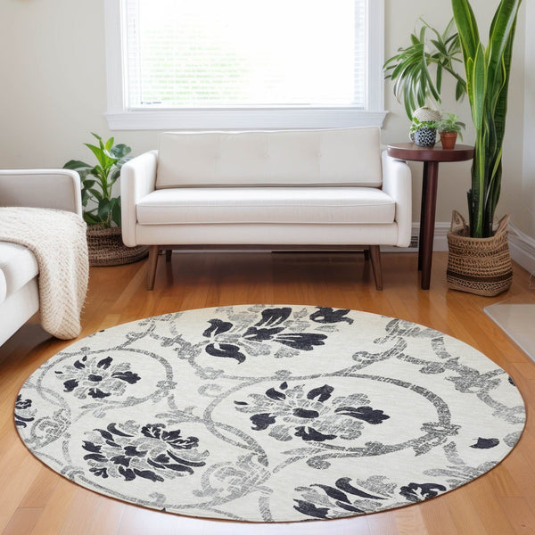 HomeRoots 8' Washable Black and Ivory Floral Round Rug with UV Protection for Elegant, Family-Friendly Living Spaces 663945