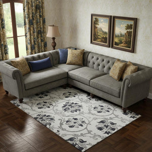 HomeRoots 9' X 12' Black And Ivory Floral Area Rug - Durable, Washable, UV Protected - Perfect for High-Traffic Spaces! 663947
