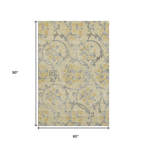 HomeRoots 5' X 8' Elegant Gold Gray Silver Floral Washable Area Rug with UV Protection for Everyday Living 663962