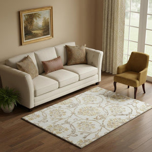 HomeRoots 5' X 8' Ivory Beige and Gold Floral Area Rug - Washable, UV-Protected, Perfect for High Traffic Areas! 663974