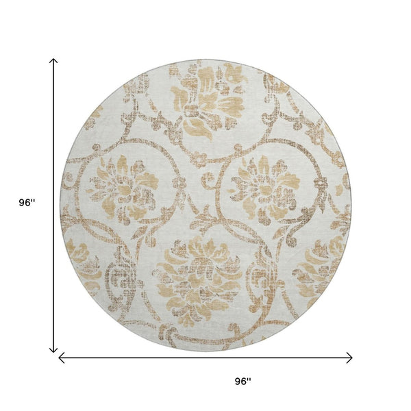 HomeRoots 8' Elegant Ivory Beige and Gold Floral Round Rug - Washable, UV Protected, Perfect for Any Room 663975