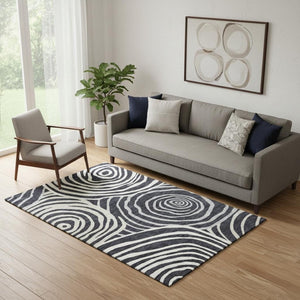 HomeRoots 5' X 8' Modern Black Ivory and Gray Abstract Area Rug - Washable, Durable, UV-Protected Design for Homes 664166