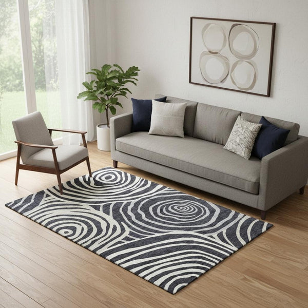 HomeRoots 5' X 8' Modern Black Ivory and Gray Abstract Area Rug - Washable, Durable, UV-Protected Design for Homes 664166