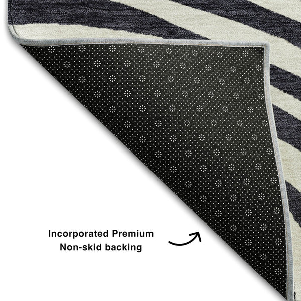 HomeRoots 5' X 8' Modern Black Ivory and Gray Abstract Area Rug - Washable, Durable, UV-Protected Design for Homes 664166