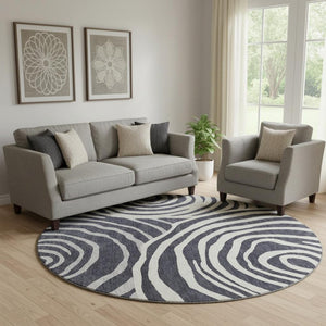 HomeRoots 8' Modern Black Ivory Gray Abstract Washable Round Rug with UV Protection & Stain Resistance 664167