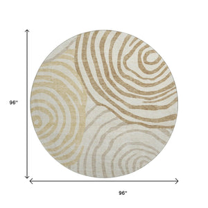 HomeRoots 8' Gold Ivory and Brown Abstract Round Rug - Washable, UV Protected, Perfect for Modern Spaces! 664191