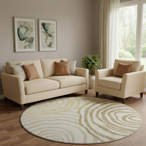 HomeRoots 8' Gold Ivory and Brown Abstract Round Rug - Washable, UV Protected, Perfect for Modern Spaces! 664191