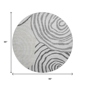 HomeRoots 8' Gray Silver and Beige Abstract Round Rug - Washable, UV-Protected, Soft for High Traffic Areas 664197