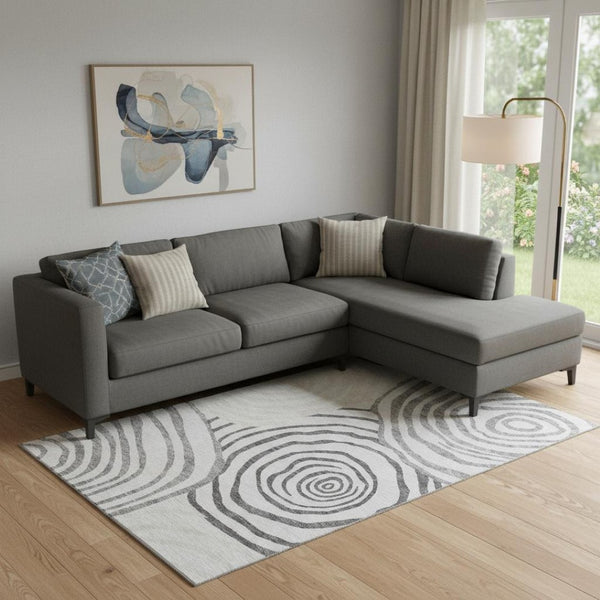 HomeRoots 9' X 12' Abstract Area Rug in Gray, Silver & Beige – Washable, UV Protected, Stain Resistant Design 664199