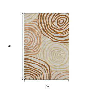 HomeRoots 5' X 8' Stylish Terra Cotta Beige & Gold Abstract Washable Area Rug with UV Protection & Durability 664232