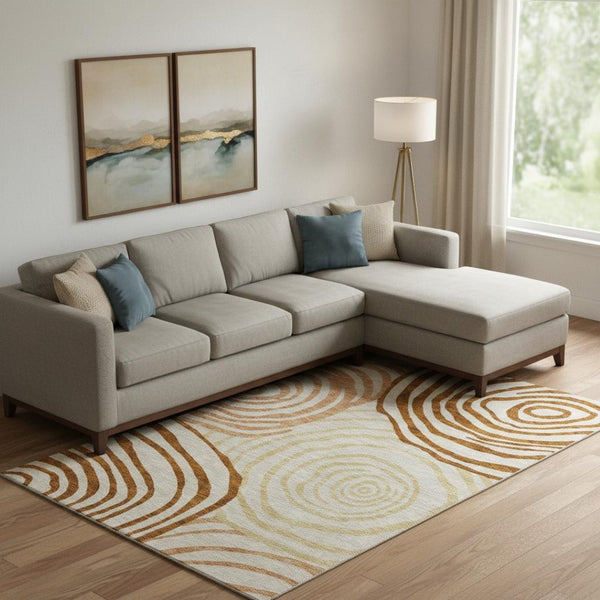HomeRoots 9' X 12' Abstract Terra Cotta and Gold Washable Area Rug with UV Protection for Modern Homes 664235