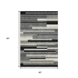 HomeRoots 5' X 8' Striped Area Rug in Black, Gray, Ivory – Washable, UV-Protected for Modern Homes & Families 664244