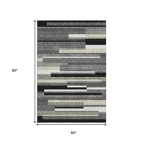 HomeRoots 5' X 8' Striped Area Rug in Black, Gray, Ivory – Washable, UV-Protected for Modern Homes & Families 664244