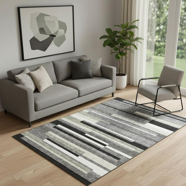 HomeRoots 5' X 8' Striped Area Rug in Black, Gray, Ivory – Washable, UV-Protected for Modern Homes & Families 664244