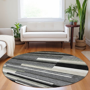 HomeRoots 8' Black Gray and Ivory Striped Washable Round Rug - Durable, UV-Protected, Ideal for Kids & Pets 664245