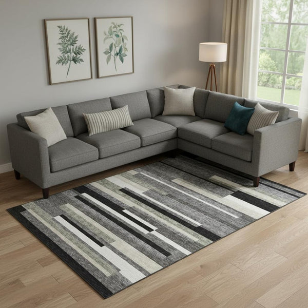 HomeRoots 10' Stylish Black, Gray, and Ivory Striped Washable Area Rug - Durable, UV Protected, Easy Care! 664248