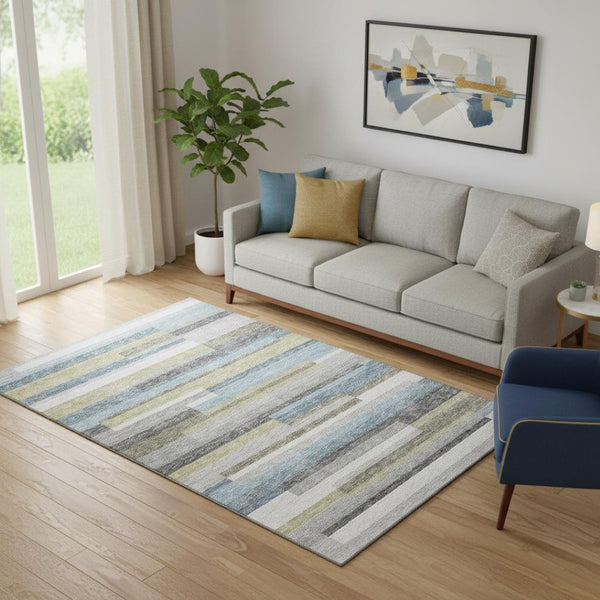 HomeRoots 5' X 8' Striped Gray Blue and Ivory Washable Area Rug with UV Protection for Stylish Living Spaces 664280