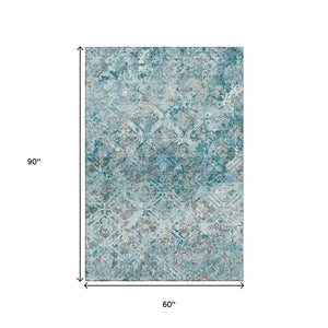 HomeRoots 5' X 8' Teal Gray Ivory Diamond Area Rug - Washable, UV Protected, Stain Resistant for Busy Homes 664448