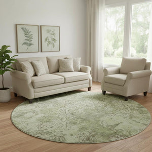 HomeRoots 8' Abstract Round Rug in Artichoke Green, Gray & Taupe - Washable, UV-Protected, Stain-Resistant Design 664461