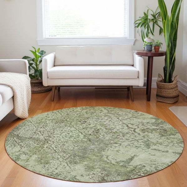 HomeRoots 8' Abstract Round Rug in Artichoke Green, Gray & Taupe - Washable, UV-Protected, Stain-Resistant Design 664461